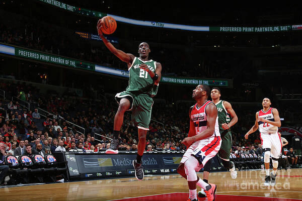 Tony Snell Poster featuring the photograph John Wall and Tony Snell by Ned Dishman