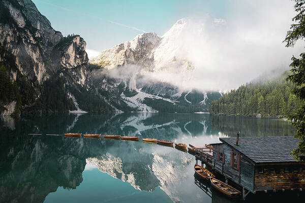 Italy Poster featuring the photograph Lago Di Braies reflecting the morning by Constantin Seuss