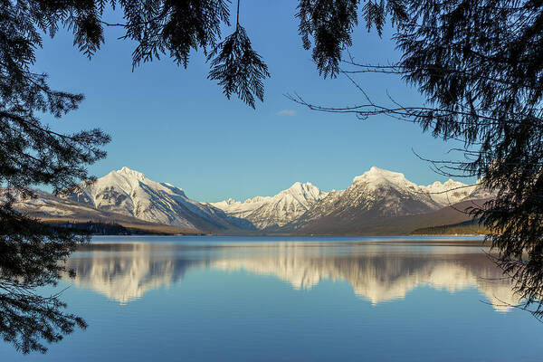 Glacier National Park Poster featuring the photograph Lake McDonald Framed by Trees by Jack Bell