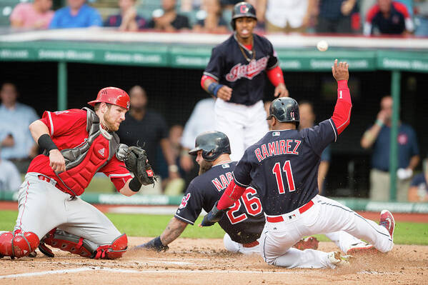 Baseball Catcher Poster featuring the photograph Mike Napoli, Lonnie Chisenhall, and Jett Bandy by Jason Miller