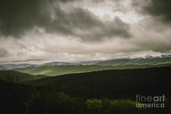 Clouds Poster featuring the photograph Moody Sky in May by Laura Honaker