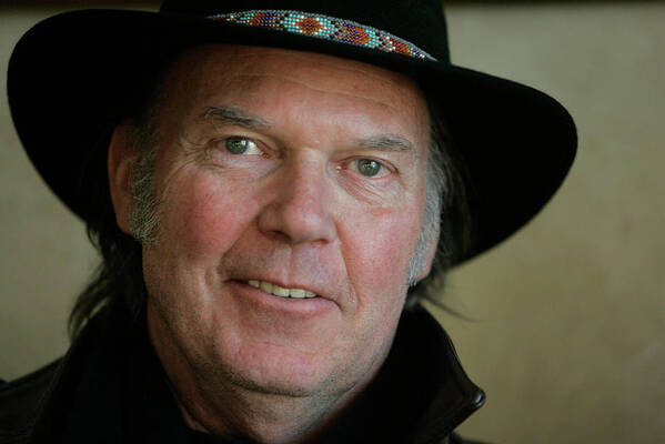 Neil Young Poster featuring the photograph Neil Young Portrait by Rick Wilking