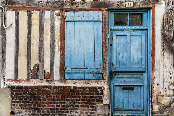 Blue Poster featuring the photograph Old building with blue door and window by Fabiano Di Paolo