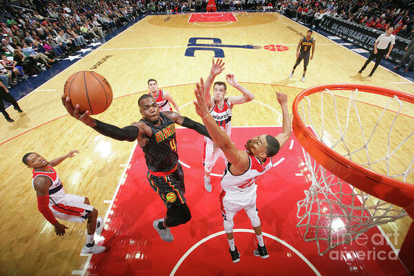 Paul Millsap Poster featuring the photograph Paul Millsap by Ned Dishman
