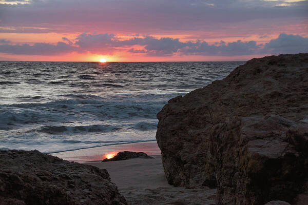 Beach Poster featuring the photograph Setting Sun Dipping Below the Horizon by Matthew DeGrushe