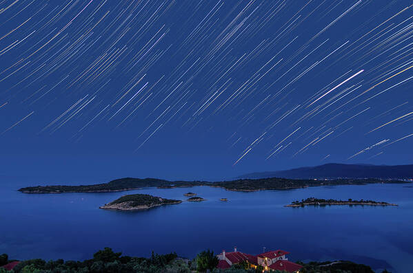 Stars Poster featuring the photograph Star Trails over Vourvourou by Alexios Ntounas