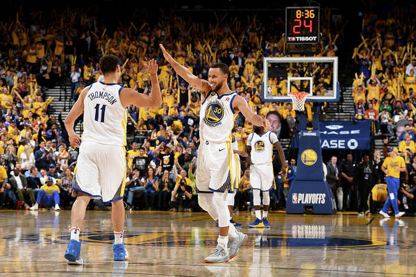 Klay Thompson Poster featuring the photograph Stephen Curry and Klay Thompson by Garrett Ellwood