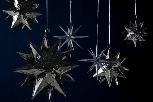 Stars Poster featuring the photograph Still Life of Silver Star Ornaments by Romulo Yanes