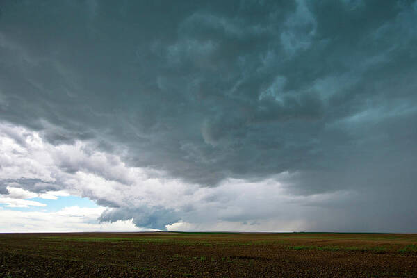 Storm Poster featuring the photograph Storm over the Plains by Wesley Aston