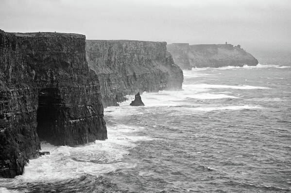 Cliff Poster featuring the photograph Stormy Moody Cliffs of Moher County Clare Ireland Black and White by Shawn O'Brien