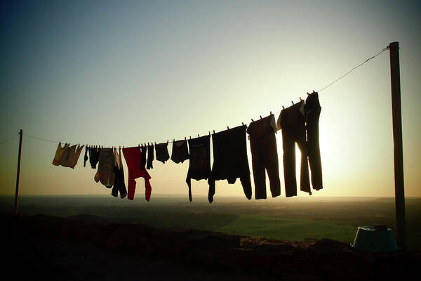 Sunset Poster featuring the photograph Sunset Clothesline by Louise Tanguay