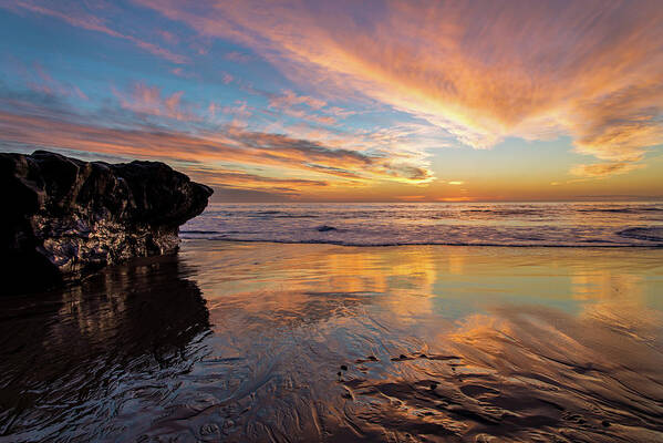 Beach Poster featuring the photograph The Rock at Sunset by Linda Villers