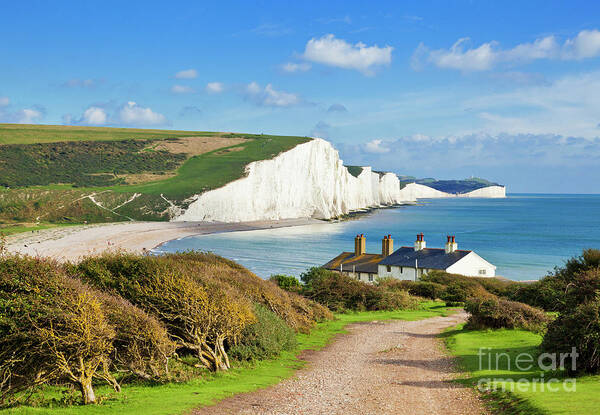 Seven Sisters Cliffs Poster featuring the photograph The Seven Sisters cliffs and coastguard cottages, South Downs, East Sussex, England by Neale And Judith Clark