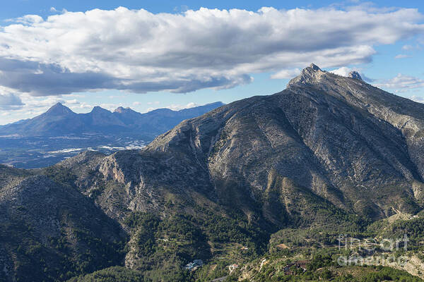Mountain Landscape Poster featuring the photograph Clouds and the Sierra de Bernia mountain range by Adriana Mueller