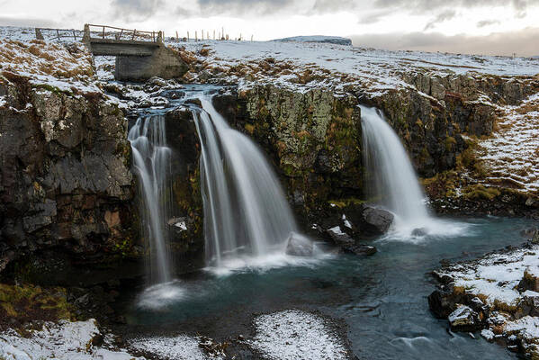 Winter Poster featuring the photograph Waterfalls near Kirkjufell by Dubi Roman