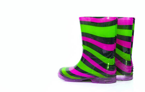 Background Poster featuring the photograph Multi Coloured wellington Boots on white with copy space #8 by Fizzy Image