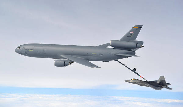1ctcs Poster featuring the photograph A KC-10 Extender refuels an F-22 Raptor by Celestial Images
