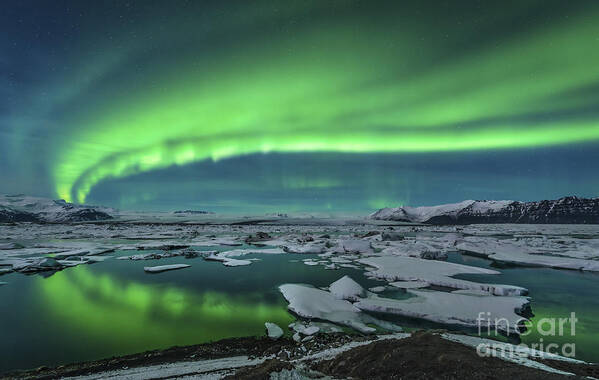 Iceland Poster featuring the photograph Aurora Borealis Over The Glacial Lagoon by John Davis