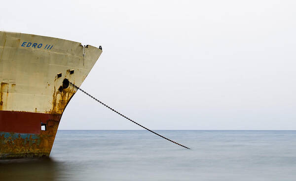 Seascape Poster featuring the photograph Abandoned ship on the ocean by Michalakis Ppalis