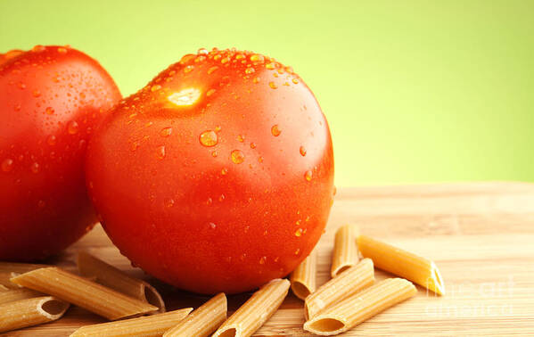 Tomato Poster featuring the photograph Tomatoes and pasta by Blink Images