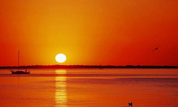 Sunset Poster featuring the photograph Gulf of Mexico sunset by Bill Jonscher