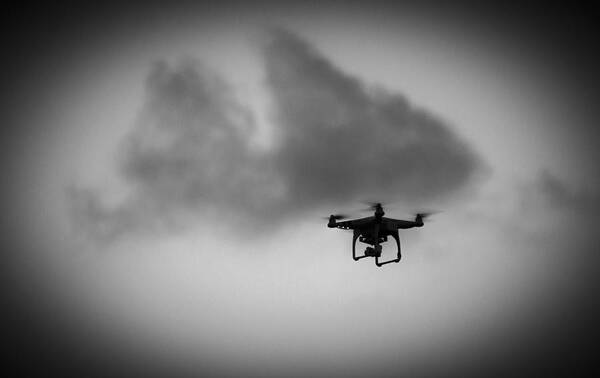 Silhouette Poster featuring the photograph Drone Silhouette by Michael Frizzell