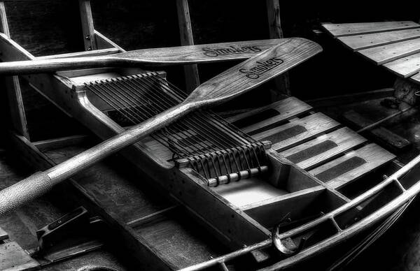 Wooden Rowboat Poster featuring the photograph Wooden Rowboat And Oars In Black And White by Carol Montoya