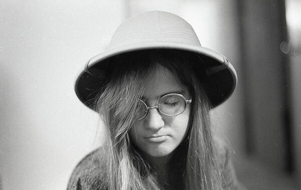 Pith Helmet Poster featuring the photograph Young Woman with Long Hair, Wearing a Pith Helmet, 1972 by Jeremy Butler