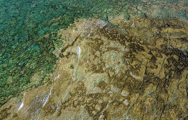 Seascape Poster featuring the photograph Aerial drone view of sea transparent water with rocks on the bottom. Ocean background by Michalakis Ppalis