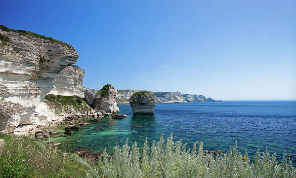 Bay Poster featuring the photograph Mediterranean sea in front of the Bonifacio Cliff by Jean-Luc Farges