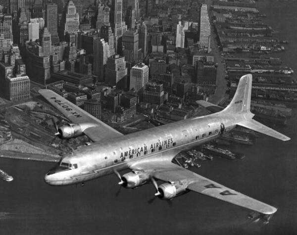 1940's Poster featuring the photograph American DC-6 Flying Over NYC by Underwood Archives