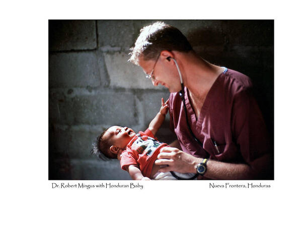 Doctor Poster featuring the photograph Doctor with Honduran Baby by Tina Manley
