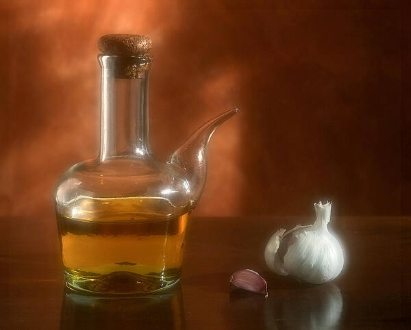 Garlic Poster featuring the photograph Garlic and Olive Oil. by Juan Carlos Ferro Duque