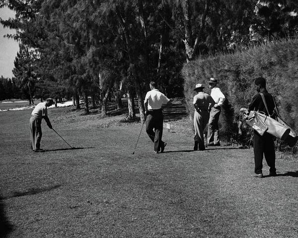 Landscape Poster featuring the photograph Men Playing Golf At The Jupiter Island Club by Serge Balkin