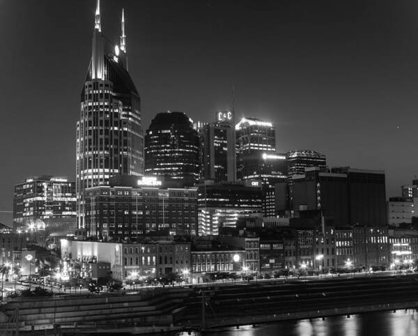 Cityscape At Night Poster featuring the photograph Riverfront Night Lights by Robert Hebert