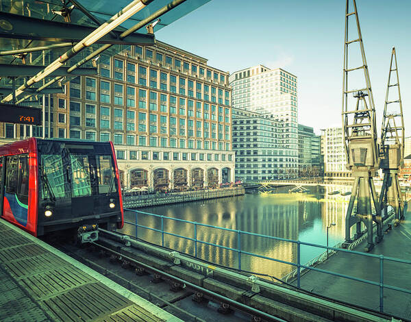 Downtown District Poster featuring the photograph Train In Subway Station At Canary by Cirano83