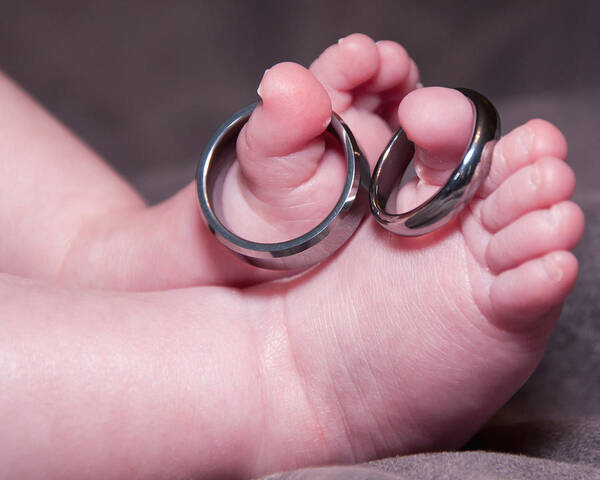 Baby Poster featuring the photograph Baby Feet With Wedding Rings by Susan Cliett