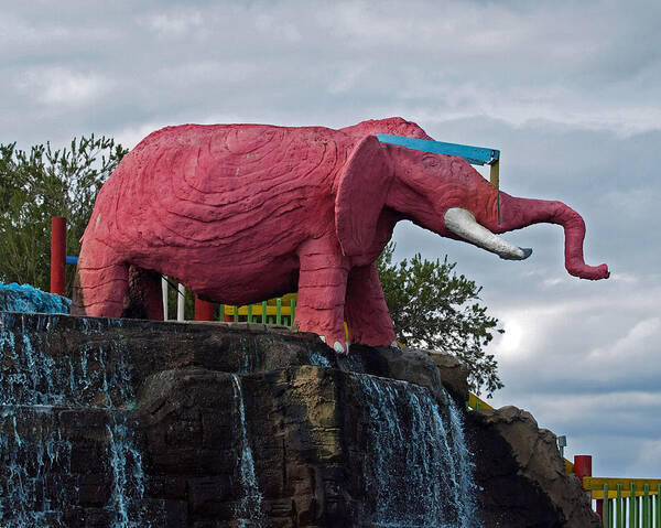 Florida; Kitsch; Roadside; Road; Side; Astronaut; Cape; Canaveral; Pinky; Elephant; Statue; Monument Poster featuring the photograph Pinky The Elephant At Cape Canaveral by Allan Hughes