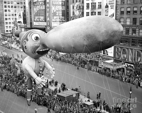 Thanksgiving Poster featuring the photograph Balloons Float Down Broadway In by New York Daily News Archive