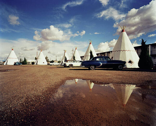 Wigwam Poster featuring the photograph Classic Cars Parked By Wigwams In Motel by Gary Yeowell