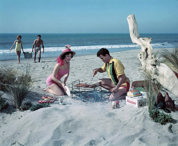 Lifestyles Poster featuring the photograph Grilling On The Beach by Tom Kelley Archive