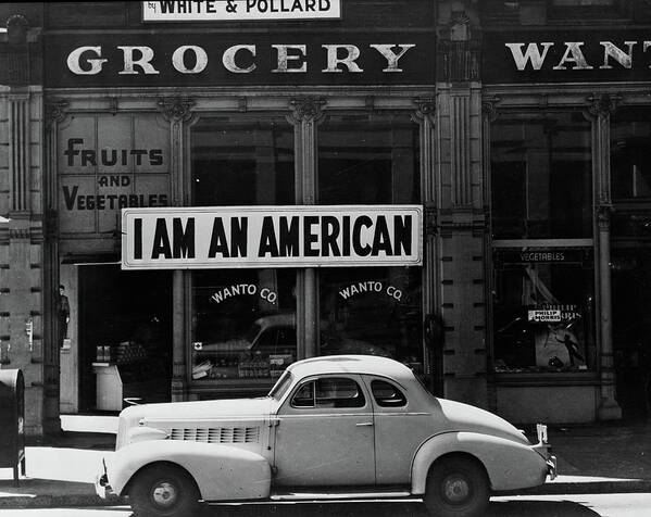 Evacuation Poster featuring the photograph Japanese American Shop Owner In Oakland, California Hopes To Avoid Internment After The Bombing Of Pearl Harbor, 1942 by Dorothea Lange