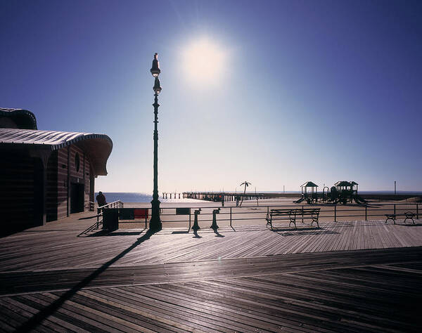 Amusement Park Poster featuring the photograph Sea View With Morning Sunlight Hitting by Eschcollection