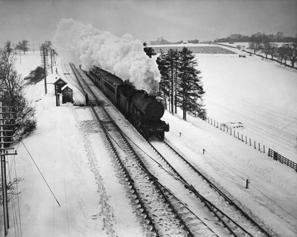 Snow Poster featuring the photograph Steam Train In Snow by Fox Photos