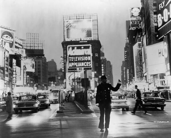 People Poster featuring the photograph Traffic In Times Square by Fpg