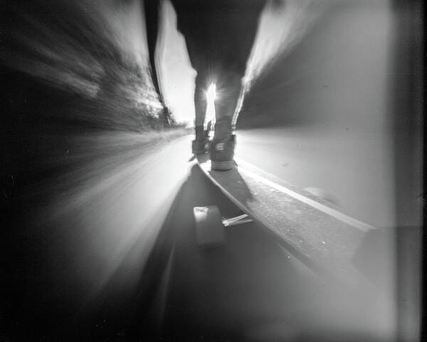 Pinhole Poster featuring the photograph Longboarding with lighthleaks by Will Gudgeon