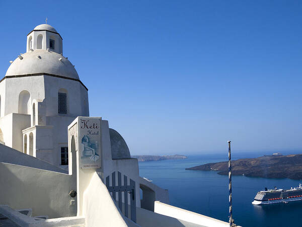 Santorini Poster featuring the photograph Church watching over the ships by Brenda Kean