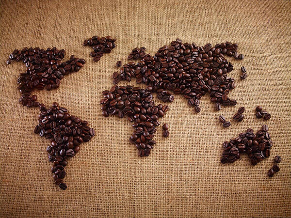 Burlap Poster featuring the photograph Coffee Beans Forming World Map On Burlap by Adam Gault