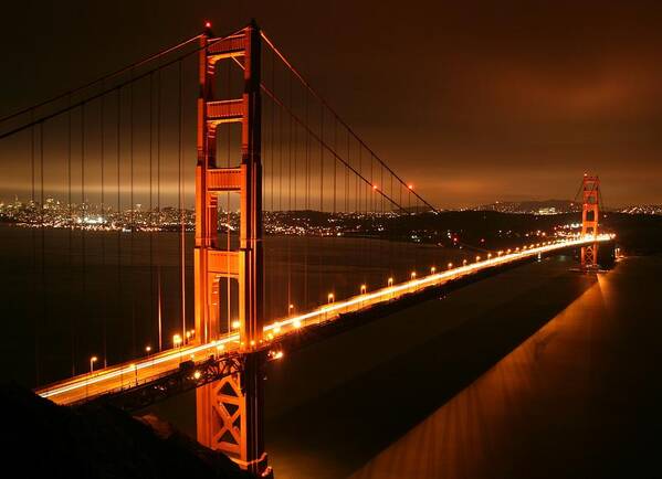 Golden Poster featuring the photograph Golden Gate Bridge in San Francisco by Jetson Nguyen