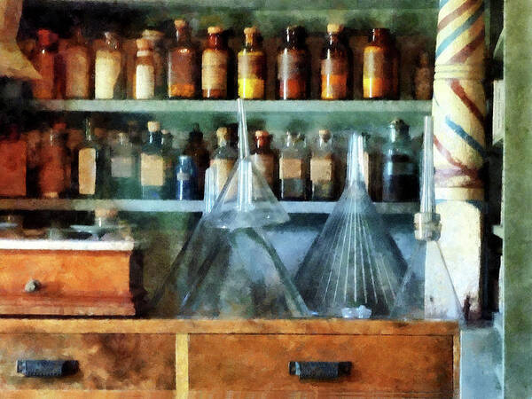 Medicine Poster featuring the photograph Pharmacist - Glass Funnels and Barber Pole by Susan Savad